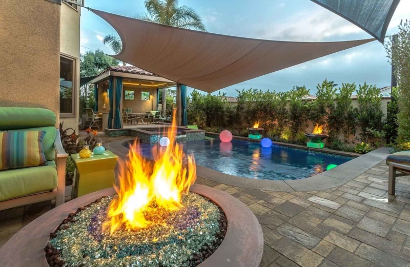 Fire pit and pool with colorful orbs