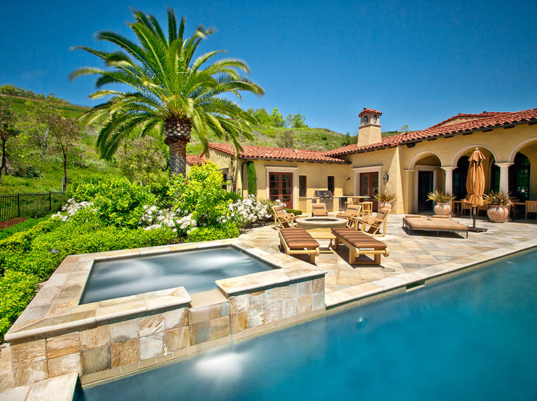 Hot tub pool and firepit with seating area