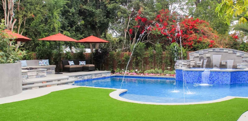 An example of turf in a backyard with a pool.
